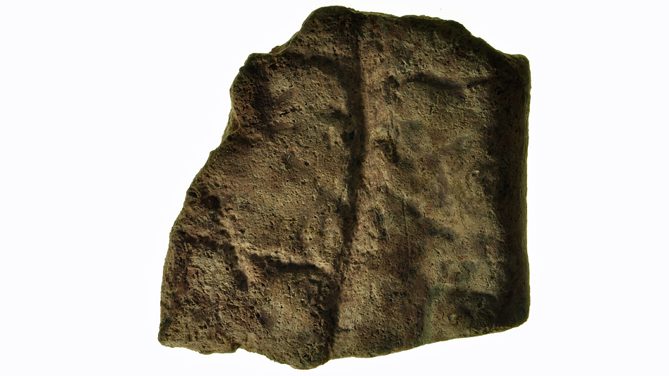 Runstensfragment i kvarteret Tullhuset